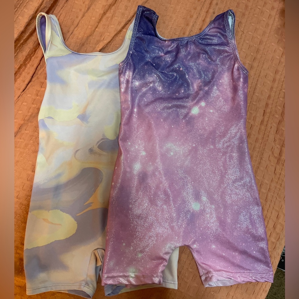 2 leotard bundle gymnastics girls 4/5, purple and pink leotards